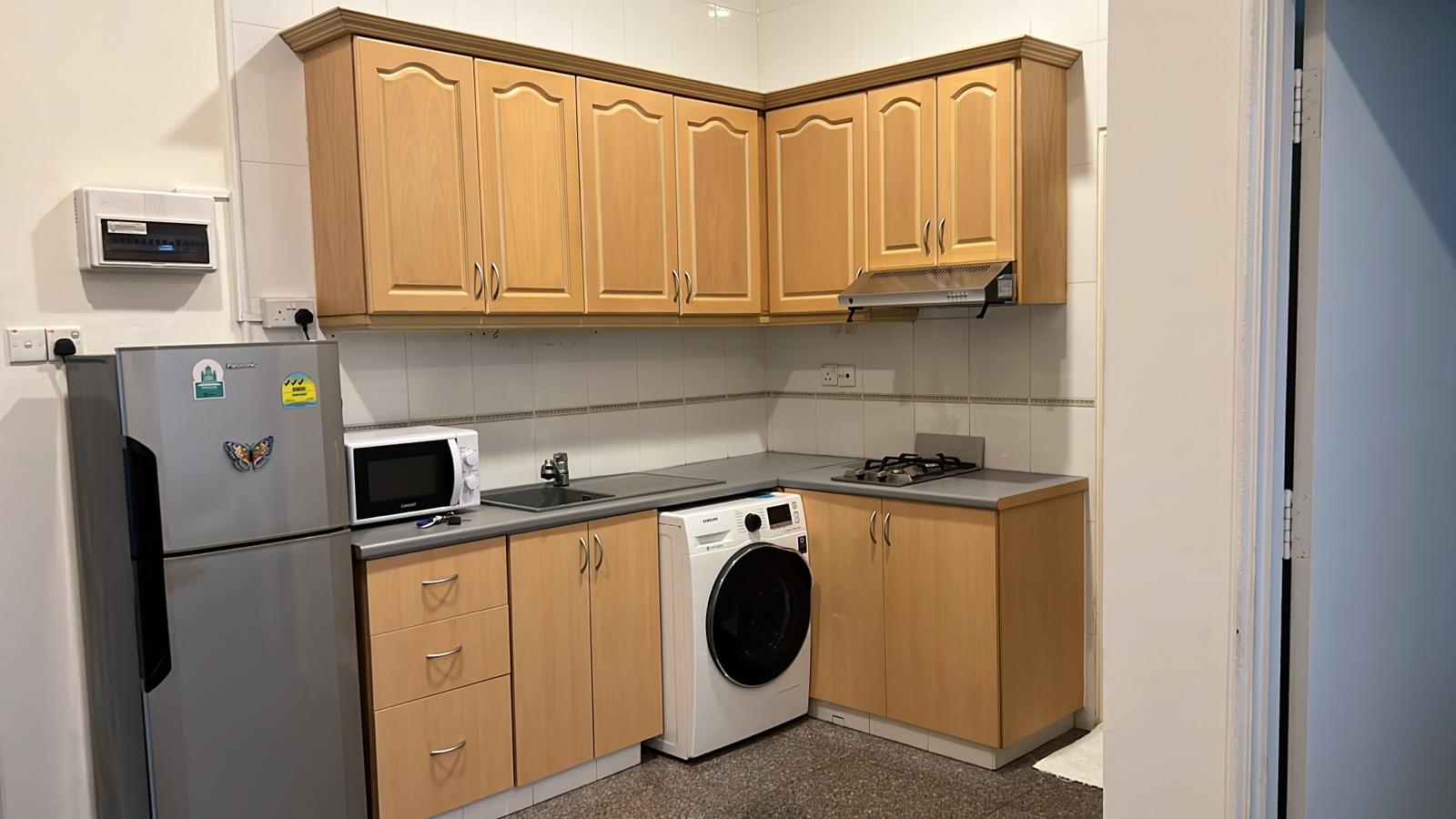 Replace new door and shelves and Side the Formica in the kitchen bottom cabinet
